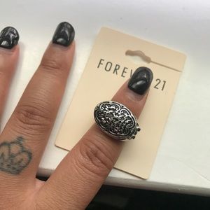 Silver ring with clasp